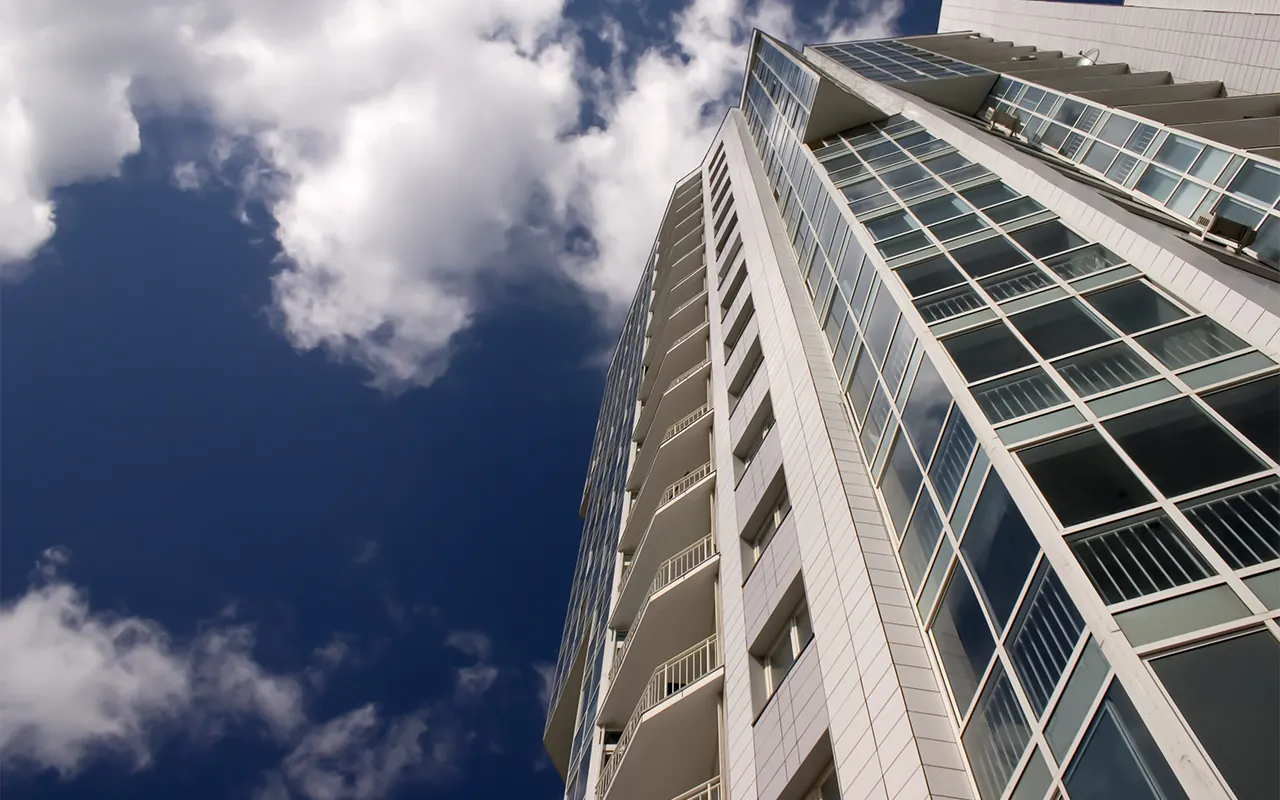 Modern skyscraper with glass balconies